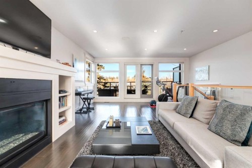2613 3 Avenue Nw, Calgary, AB - Indoor Photo Showing Living Room With Fireplace