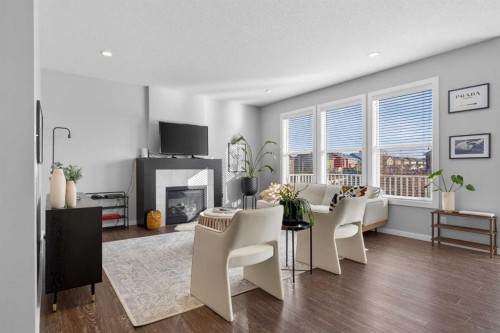 126 Bayview Circle Sw, Airdrie, AB - Indoor With Fireplace