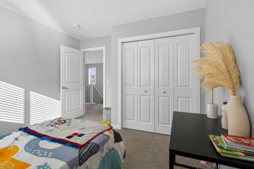 126 Bayview Circle Sw, Airdrie, AB - Indoor Photo Showing Bedroom