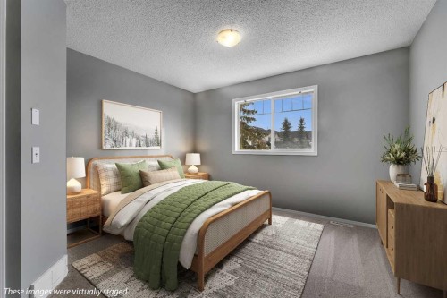 68 Panatella Villas Nw, Calgary, AB - Indoor Photo Showing Bedroom