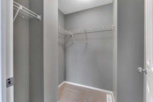 68 Panatella Villas Nw, Calgary, AB - Indoor With Storage
