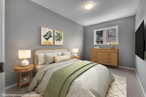 68 Panatella Villas Nw, Calgary, AB - Indoor Photo Showing Bedroom