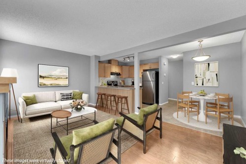 68 Panatella Villas Nw, Calgary, AB - Indoor Photo Showing Living Room