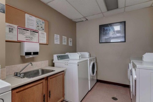 603-1011 12 Avenue, Calgary, AB - Indoor Photo Showing Laundry Room