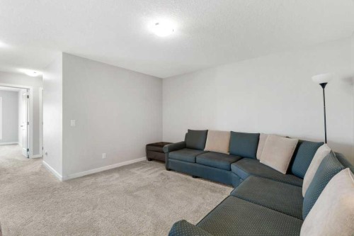 234 Carringsby Way Nw, Calgary, AB - Indoor Photo Showing Living Room
