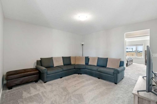 234 Carringsby Way Nw, Calgary, AB - Indoor Photo Showing Living Room