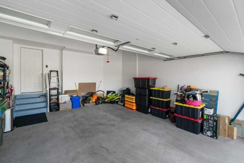 234 Carringsby Way Nw, Calgary, AB - Indoor Photo Showing Garage