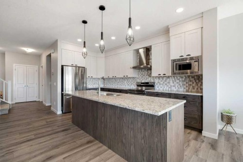 234 Carringsby Way Nw, Calgary, AB - Indoor Photo Showing Kitchen With Stainless Steel Kitchen With Upgraded Kitchen