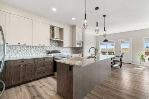 234 Carringsby Way Nw, Calgary, AB - Indoor Photo Showing Kitchen With Upgraded Kitchen