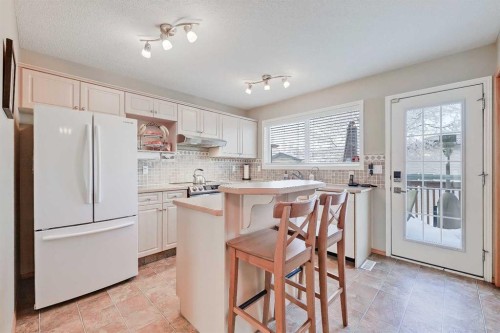312 Cramond Close Se, Calgary, AB - Indoor Photo Showing Kitchen With Upgraded Kitchen