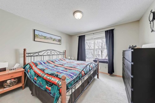 312 Cramond Close Se, Calgary, AB - Indoor Photo Showing Bedroom