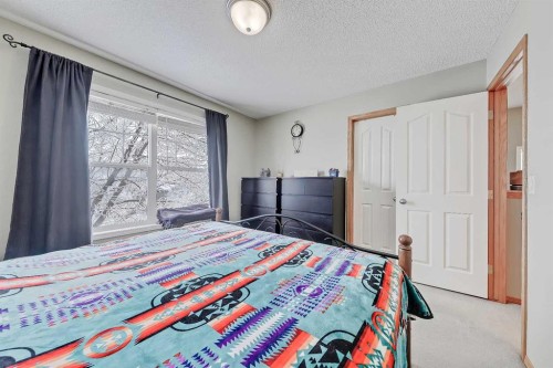 312 Cramond Close Se, Calgary, AB - Indoor Photo Showing Bedroom