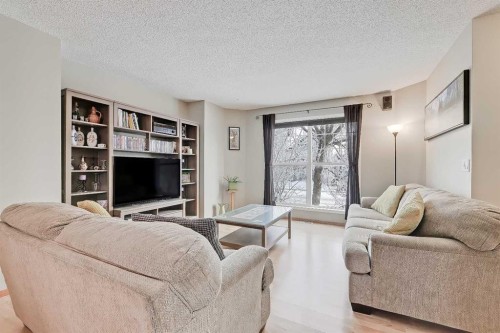 312 Cramond Close Se, Calgary, AB - Indoor Photo Showing Living Room