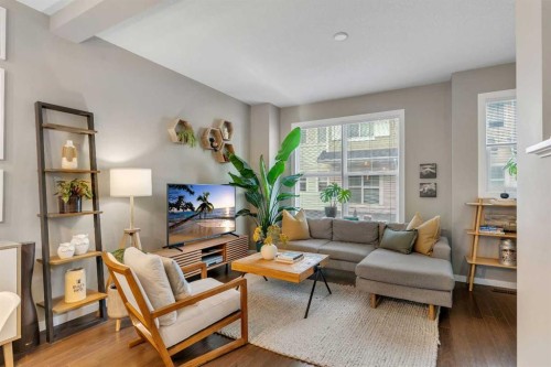 221 New Brighton Row Se, Calgary, AB - Indoor Photo Showing Living Room