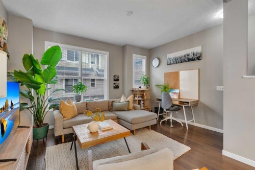 221 New Brighton Row Se, Calgary, AB - Indoor Photo Showing Living Room