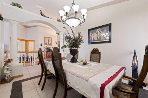 16 Arbour Estates View Nw, Calgary, AB - Indoor Photo Showing Dining Room