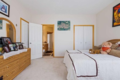 16 Arbour Estates View Nw, Calgary, AB - Indoor Photo Showing Bedroom