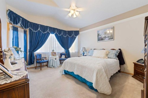 16 Arbour Estates View Nw, Calgary, AB - Indoor Photo Showing Bedroom
