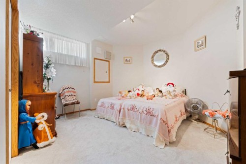 16 Arbour Estates View Nw, Calgary, AB - Indoor Photo Showing Bedroom