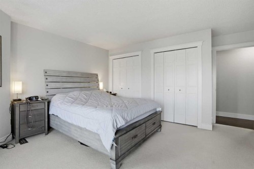 311 Coach Light Bay Sw, Calgary, AB - Indoor Photo Showing Bedroom