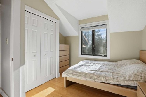 311 Coach Light Bay Sw, Calgary, AB - Indoor Photo Showing Bedroom