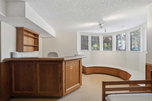 311 Coach Light Bay Sw, Calgary, AB - Indoor Photo Showing Other Room