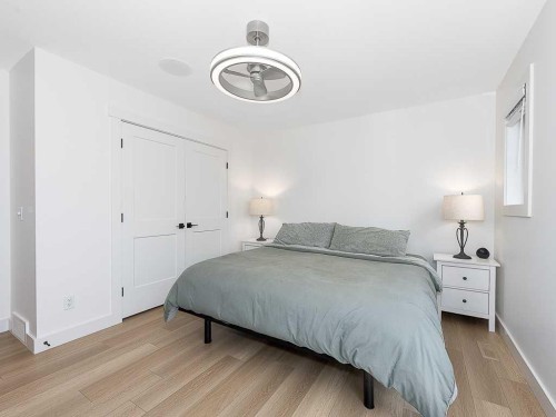 613 Lambeau Link Se, Airdrie, AB - Indoor Photo Showing Bedroom