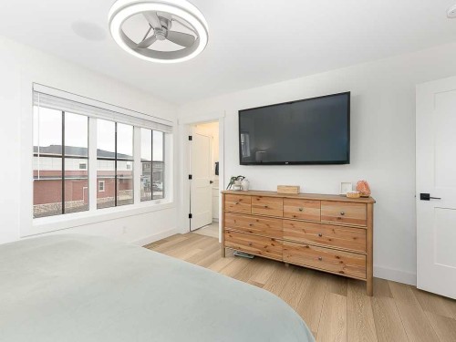 613 Lambeau Link Se, Airdrie, AB - Indoor Photo Showing Bedroom
