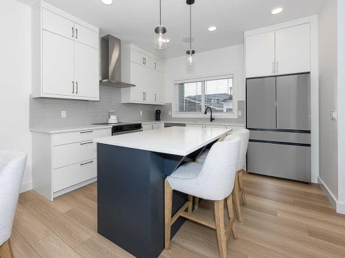 613 Lambeau Link Se, Airdrie, AB - Indoor Photo Showing Kitchen With Upgraded Kitchen