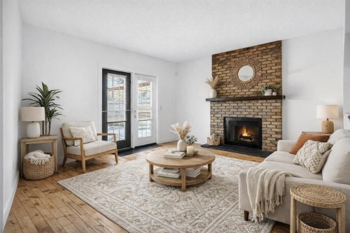 128 Bermuda Drive Nw, Calgary, AB - Indoor Photo Showing Living Room With Fireplace