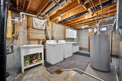 128 Bermuda Drive Nw, Calgary, AB - Indoor Photo Showing Laundry Room