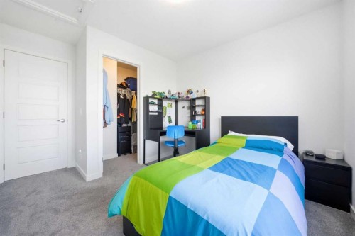 66 Evanscrest Manor Nw, Calgary, AB - Indoor Photo Showing Bedroom