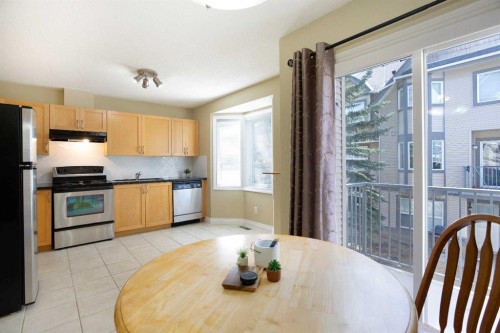 120 Cedarwood Lane Sw, Calgary, AB - Indoor Photo Showing Kitchen With Stainless Steel Kitchen