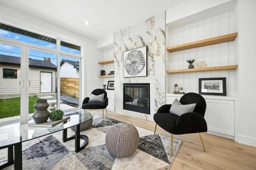 926 21 Avenue Nw, Calgary, AB - Indoor Photo Showing Living Room With Fireplace