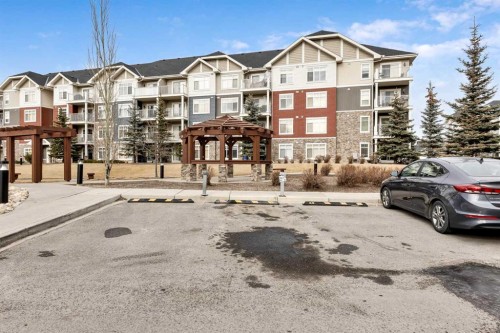 1302-155 Skyview Ranch Way Ne, Calgary, AB - Outdoor With Balcony With Facade
