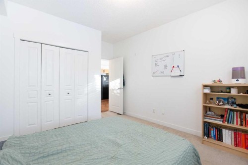 1116-211 Aspen Stone Boulevard Sw, Calgary, AB - Indoor Photo Showing Bedroom