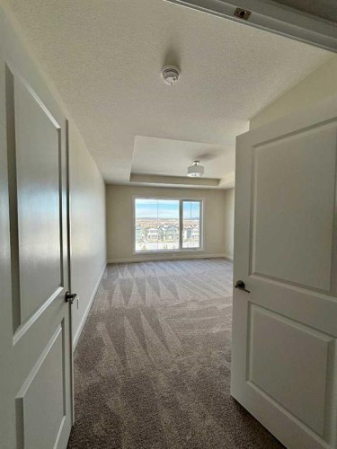 695 Buffaloberry Manor Se, Calgary, AB - Indoor Photo Showing Other Room