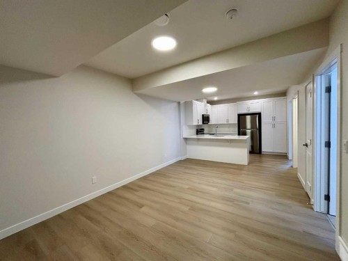 695 Buffaloberry Manor Se, Calgary, AB - Indoor Photo Showing Other Room