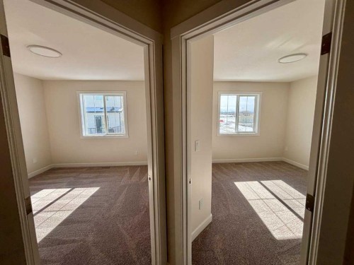 695 Buffaloberry Manor Se, Calgary, AB - Indoor Photo Showing Other Room