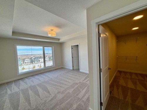 695 Buffaloberry Manor Se, Calgary, AB - Indoor Photo Showing Other Room