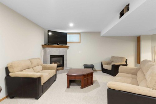 131 Cambria Road, Strathmore, AB - Indoor With Fireplace