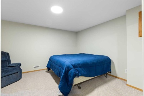 131 Cambria Road, Strathmore, AB - Indoor Photo Showing Bedroom