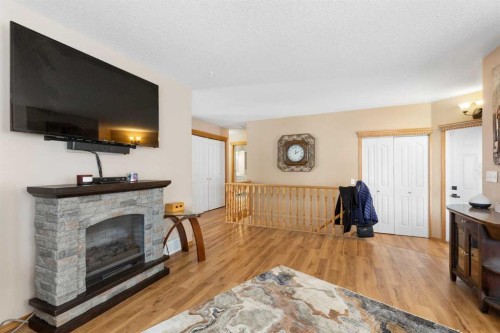 131 Cambria Road, Strathmore, AB - Indoor Photo Showing Living Room With Fireplace