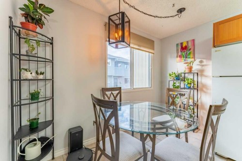9-6503 Ranchview Drive Nw, Calgary, AB - Indoor Photo Showing Dining Room