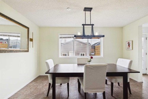 121 River Heights Crescent, Cochrane, AB - Indoor Photo Showing Dining Room