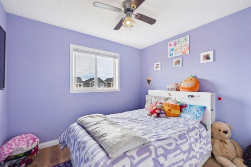 121 River Heights Crescent, Cochrane, AB - Indoor Photo Showing Bedroom