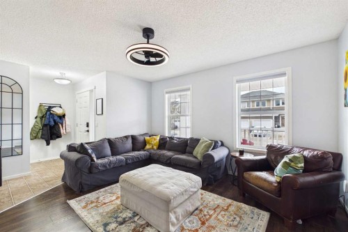 121 River Heights Crescent, Cochrane, AB - Indoor Photo Showing Living Room