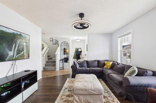 121 River Heights Crescent, Cochrane, AB - Indoor Photo Showing Living Room