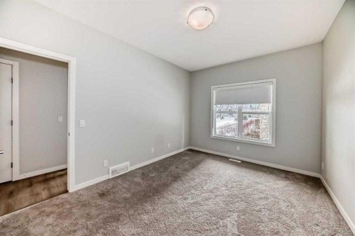 401-250 Fireside View, Cochrane, AB - Indoor Photo Showing Other Room