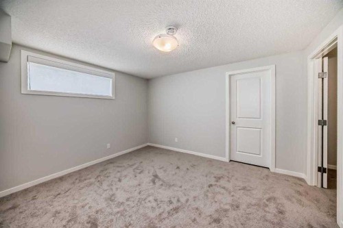 401-250 Fireside View, Cochrane, AB - Indoor Photo Showing Other Room